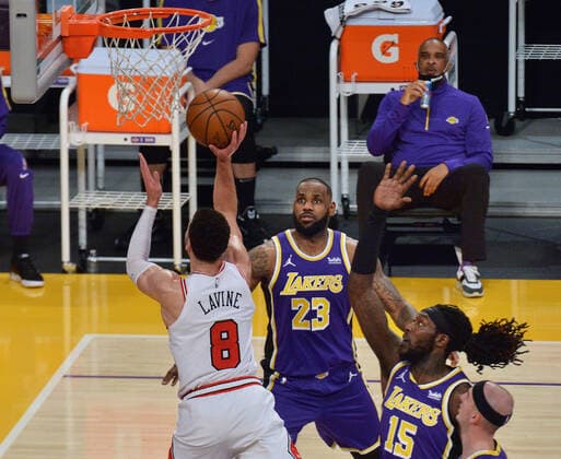 Chicago Bulls Zach Lavine scores over Los Angeles LeBron James during the first quarter at Staples Center in Los Angeles on Friday, January 8, 2021. The Lakers defeated the Bulls 117-115.  LAP2021010823 JIMxRUYMEN
