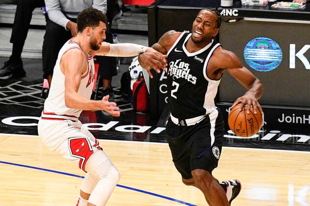 LOS ANGELES, CA - JANUARY 10: Los Angeles Clippers Forward Kawhi Leonard (2) is fouled make a move by Chicago Bulls Guard Zach LaVine (8) during a NBA, Basketball Herren, USA game between the Chicago Bulls and the Los Angeles Clippers on January 10, 2021 at STAPLES Center in Los Angeles, CA.The game was played without fans due to the COVID-19 pandemic. (Photo by Brian Rothmuller Icon Sportswire) NBA: JAN 10 Bulls at Clippers Icon210110011
