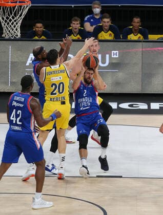 Adrien Moerman , Bryant Dunston (42) of Anadolu Efes and Simone Fontecchio (20) of Alba Berlin during the Turksih Airlines Euroleague Basketball match between Anadolu Efes and Alba Berlin at Sinan Erdem Arena in Istanbul , Turkey on January 12 , 2021. 