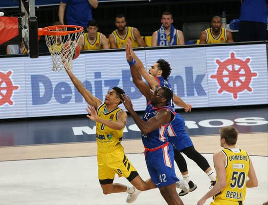 Shane Larkin (R) , Bryant Dunston of Anadolu Efes and Maodo Lo (0) of Alba Berlin during the Turksih Airlines Euroleague Basketball match between Anadolu Efes and Alba Berlin at Sinan Erdem Arena in Istanbul , Turkey on January 12 , 2021. 