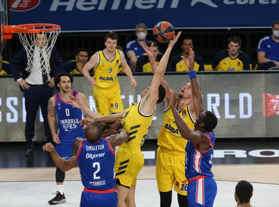 Shane Larkin (0) , Chris Singleton (2) , Bryant Dunston (42) of Anadolu Efes and Kresimir Nikic (16) , Simone Fontecchio (20) of Alba Berlin during the Turksih Airlines Euroleague Basketball match between Anadolu Efes and Alba Berlin at Sinan Erdem Arena in Istanbul , Turkey on January 12 , 2021. 
