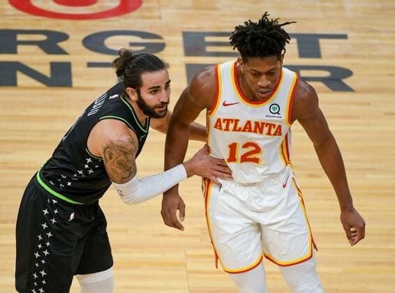 Minnesota Timberwolves guard Ricky Rubio (L) battles for position with Atlanta Hawks forward De Andre HunterÃŠ(R) during the second half of their NBA, Basketball Herren, USA basketball game between the Atlanta Hawks and the Minnesota Timberwolves at Target Center in Minneapolis, Minnesota, USA, 22 January, 2021. Atlanta Hawks at Minnesota Timberwolves !ACHTUNG: NUR REDAKTIONELLE NUTZUNG!  Copyright: xCRAIGxLASSIGx AME860 20210123-637469719562244314