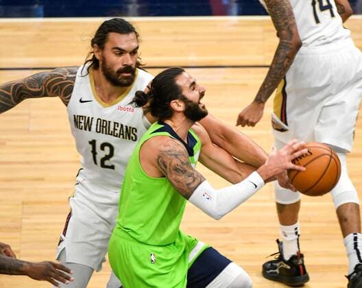 Minnesota Timberwolves guard Ricky Rubio (C) is fouled by New Orleans Pelicans center Steven AdamsÊ(R) during the first half of their NBA, Basketball Herren, USA basketball game between the New Orleans Pelicans and the Minnesota Timberwolves at Target Center in Minneapolis, Minnesota, USA, 23 January, 2021. New Orleans Pelicans - Minnesota Timberwolves !ACHTUNG: NUR REDAKTIONELLE NUTZUNG!  Copyright: xCRAIGxLASSIGx AME1047 20210124-637470602933387137
