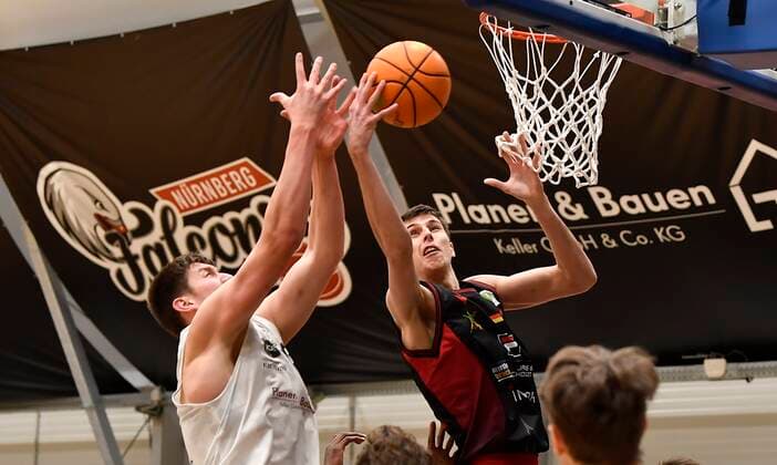 24.01.2021 - Basketball - Saison 2020 2021 - 2. Bundesliga Pro-A - 17. Spieltag: Nürnberg Falcons Basketball Club NBC - Artland Dragons Quakenbrück - - Jonathan Maier (13, Nürnberg Falcons BC NBC ) Jacob Knauf (25, Artland Dragons )