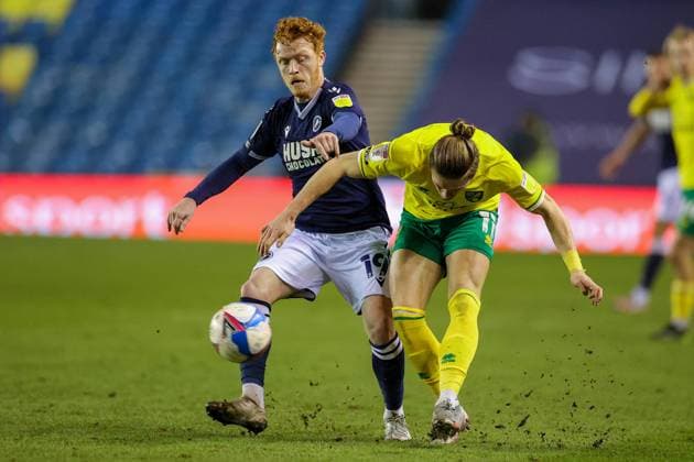 Millwall v Norwich City EFL Sky Bet Championship 02 02 2021. Przemyslaw Placheta (11) of Norwich City battles with Ryan Woods (19) of Millwall during the EFL Sky Bet Championship match between Millwall and Norwich City at The Den, London, England on 2 February 2021. Editorial use only DataCo restrictions apply See www.football-dataco.com , Copyright: xNigelxKeenex PSI-11769-0025