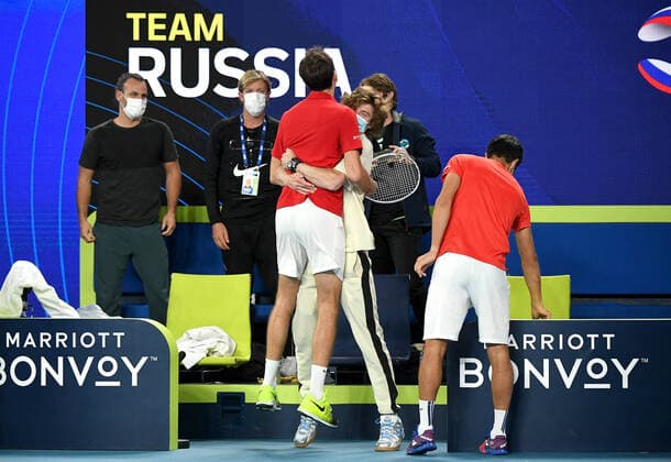 TENNIS ATP, Tennis Herren CUP, Daniil Medvedev of Russia is lifted by team member Andrey Rubley as team Russia celebrates Medvedevs win over Alexander Zverev of Germany during the ATP Cup semi-final at Melbourne Park in Melbourne, Saturday, February 6, 2021 .( NO ARCHIVING, EDITORIAL USE ONLY, NO USE IN BOOKS WITHOUT CONSENT MELBOURNE VIC AUSTRALIA  Copyright: xDAVExHUNTx 20210206001518639319
