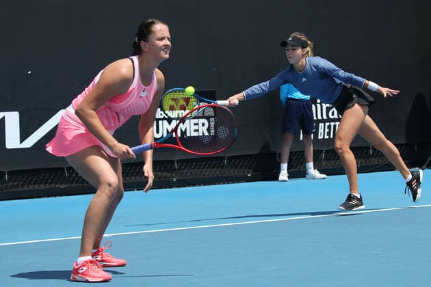 Anna Kalinskaya, RUS (blue), and Viktoria Kuzmova, SVK (pink), during 2021 Melbourne Summer Series (AO pre-tournaments) in Melbourne, 06 02 2021; -