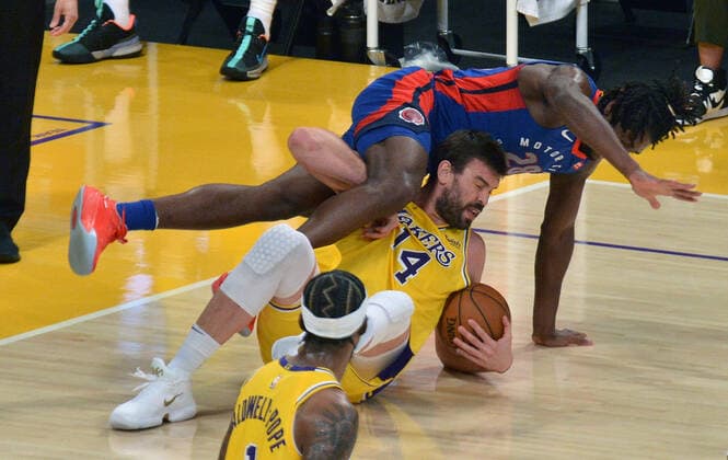 Los Angeles Lakers center Marc Gasol is fouled by Detroit Pistons center Isaiah Stewart as he secures the offensive rebound during the third quarter at Staples Center in Los Angeles on Saturday, February 6, 2021. The Lakers defeated the Pistons 135-129 in double-overtime.  LAP2021020617 JIMxRUYMEN
