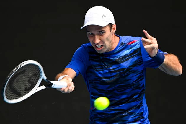 TENNIS AUSTRALIAN OPEN, Mikhail Kukushkin of Kazakhstan in action during his first Round Men s singles match against Dominic Thiem of Austria on Day 1 of the Australian Open at Melbourne Park in Melbourne, Monday, February 8, 2021. ( NO ARCHIVING, EDITORIAL USE ONLY, NO USE IN BOOKS WITHOUT CONSENT MELBOURNE VIC AUSTRALIA  Copyright: xDAVExHUNTx 20210208001519122179