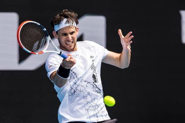 MELBOURNE, VIC - FEBRUARY 08: Dominic Thiem of Austria returns the ball during round 1 of the 2021 Australian Open on February 8 2020, at Melbourne Park in Melbourne, Australia. (Photo by Jason Heidrich Icon Sportswire) TENNIS: FEB 08 Australian Open Icon2102081231