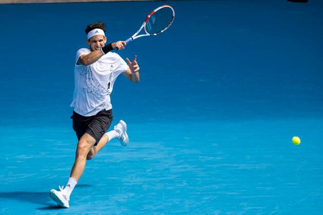 MELBOURNE, VIC - FEBRUARY 08: Dominic Thiem of Austria returns the ball during round 1 of the 2021 Australian Open on February 8 2020, at Melbourne Park in Melbourne, Australia. (Photo by Jason Heidrich Icon Sportswire) TENNIS: FEB 08 Australian Open Icon2102081311