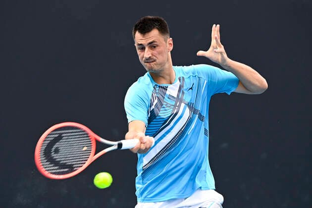 TENNIS AUSTRALIAN OPEN, Bernard Tomic of Australia in action during his first Round Men s singles match against Yuichi Sugita of Japan on Day 1 of the Australian Open at Melbourne Park in Melbourne, Monday, February 8, 2021. ( NO ARCHIVING, EDITORIAL USE ONLY, NO USE IN BOOKS WITHOUT CONSENT MELBOURNE VIC AUSTRALIA  Copyright: xDAVExHUNTx 20210208001519163101