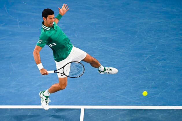 TENNIS AUSTRALIAN OPEN, Novak Djokovic of Serbia in action during his first Round Men s singles match against Jeremy Chardy of the United States of America on Day 1 of the Australian Open at Melbourne Park in Melbourne, Monday, February 8, 2021. ( NO ARCHIVING, EDITORIAL USE ONLY, NO USE IN BOOKS WITHOUT CONSENT MELBOURNE VIC AUSTRALIA  Copyright: xDAVExHUNTx 20210208001519171708