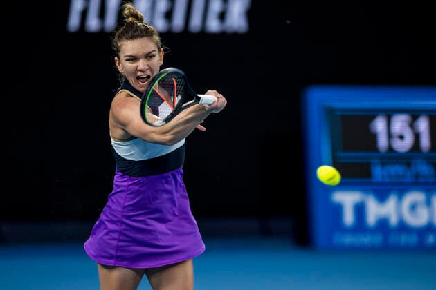 MELBOURNE, VIC - FEBRUARY 08: Simona Halep of Romania returns the ball during round 1 of the 2021 Australian Open on February 8 2020, at Melbourne Park in Melbourne, Australia. (Photo by Jason Heidrich Icon Sportswire) TENNIS: FEB 08 Australian Open Icon2102082421