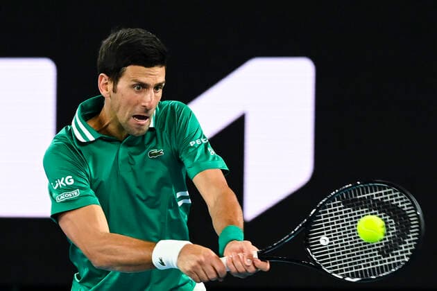 TENNIS AUSTRALIAN OPEN, Novak Djokovic of Serbia in action during his first Round Men s singles match against Jeremy Chardy of the United States of America on Day 1 of the Australian Open at Melbourne Park in Melbourne, Monday, February 8, 2021. ( NO ARCHIVING, EDITORIAL USE ONLY, NO USE IN BOOKS WITHOUT CONSENT MELBOURNE VIC AUSTRALIA  Copyright: xDAVExHUNTx 20210208001519180321