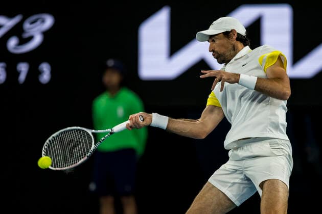 MELBOURNE, VIC - FEBRUARY 08: Jeremy Chardy of France returns the ball during round 1 of the 2021 Australian Open on February 8 2020, at Melbourne Park in Melbourne, Australia. (Photo by Jason Heidrich Icon Sportswire) TENNIS: FEB 08 Australian Open Icon2102082501