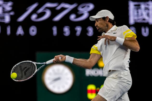 MELBOURNE, VIC - FEBRUARY 08: Jeremy Chardy of France returns the ball during round 1 of the 2021 Australian Open on February 8 2020, at Melbourne Park in Melbourne, Australia. (Photo by Jason Heidrich Icon Sportswire) TENNIS: FEB 08 Australian Open Icon2102082541