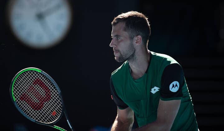 (210209) -- MELBOURNE, Feb. 9, 2021 -- Laslo Djere of Serbia returns a shot during the men s singles first round match between Rafael Nadal of Spain and Laslo Djere of Serbia at the Australian Open in Melbourne Park, Melbourne, Australia on Feb. 9, 2021. (Photo by Xinhua) (SP)AUSTRALIA-MELBOURNE-TENNIS-AUSTRALIAN OPEN-DAY 2 HuxJingChen 