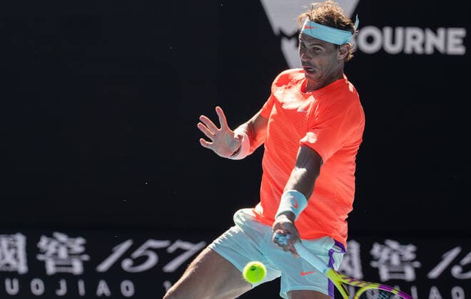 (210209) -- MELBOURNE, Feb. 9, 2021 -- Rafael Nadal of Spain returns a shot during the men s singles first round match between Rafael Nadal of Spain and Laslo Djere of Serbia at the Australian Open in Melbourne Park, Melbourne, Australia on Feb. 9, 2021. (Photo by Xinhua) (SP)AUSTRALIA-MELBOURNE-TENNIS-AUSTRALIAN OPEN-DAY 2 HuxJingChen 