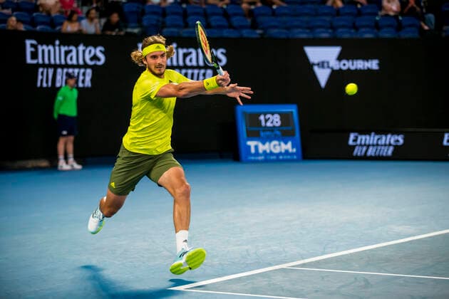 MELBOURNE, VIC - FEBRUARY 09: Stefanos Tsitsipas of Greece returns the ball during round 1 of the 2021 Australian Open on February 9 2020, at Melbourne Park in Melbourne, Australia. (Photo by Jason Heidrich Icon Sportswire) TENNIS: FEB 09 Australian Open Icon2102092042