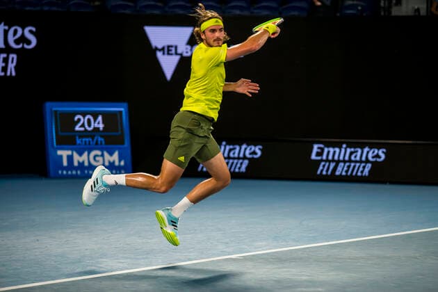 MELBOURNE, VIC - FEBRUARY 09: Stefanos Tsitsipas of Greece returns the ball during round 1 of the 2021 Australian Open on February 9 2020, at Melbourne Park in Melbourne, Australia. (Photo by Jason Heidrich Icon Sportswire) TENNIS: FEB 09 Australian Open Icon2102092242