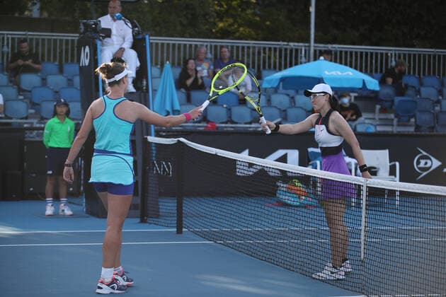 (210209) -- MELBOURNE, Feb. 9, 2021 -- Barbora Krejcikova (L) of Czech Republic greets Zheng Saisai of China during the women s singles first round match between Barbora Krejcikova of Czech Republic and Zheng Saisai of China at the Australian Open in Melbourne Park, Melbourne, Australia on Feb. 9, 2021. Bai Xuefei) (SP)AUSTRALIA-MELBOURNE-TENNIS-AUSTRALIAN OPEN-DAY 2 BaixXuefeihujingchen 