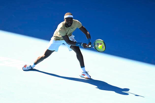 TENNIS AUSTRALIAN OPEN, Frances Tiafoe of the United States of America in action during his second Round Men s singles match against Novak Djokovic of Serbia on Day 3 of the Australian Open at Melbourne Park in Melbourne, Wednesday, February 10, 2021. ( NO ARCHIVING, EDITORIAL USE ONLY, NO USE IN BOOKS WITHOUT CONSENT MELBOURNE VIC AUSTRALIA  Copyright: xDAVExHUNTx 20210210001519558603