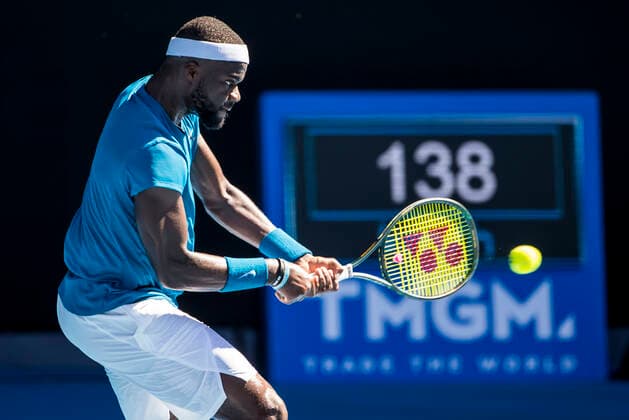 MELBOURNE, VIC - FEBRUARY 10: Frances Tiafoe of the United States of America returns the ball during round 2 of the 2021 Australian Open on February 10 2020, at Melbourne Park in Melbourne, Australia. (Photo by Jason Heidrich Icon Sportswire) TENNIS: FEB 10 Australian Open Icon2102101073