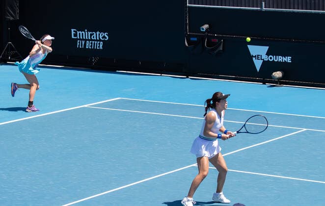 (210210) -- MELBOURNE, Feb. 10, 2021 -- Zhu Lin (R) Mona Barthel compete during the women s doubles first round match between Zhu Lin (China) Mona Barthel (Germany) and Aliaksandra Sasnovich (Belarus) Marta Kostyuk (Ukraine) at the Australian Open in Melbourne Park, Melbourne, Australia on Feb. 10, 2021. (Photo by Xinhua) (SP)AUSTRALIA-MELBOURNE-TENNIS-AUSTRALIAN OPEN-DAY 3 HuxJingchen 
