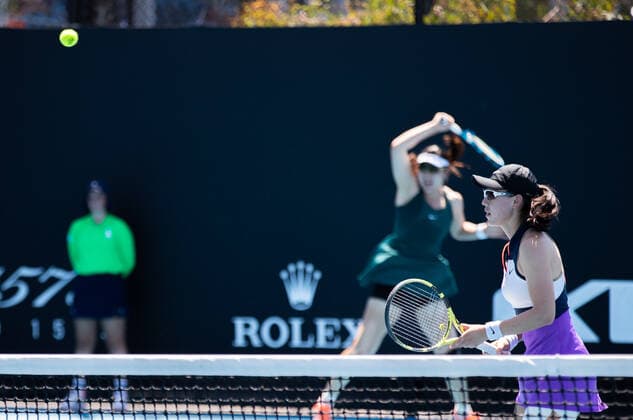 (210210) -- MELBOURNE, Feb. 10, 2021 -- Zheng Saisai Duan Yingying (L) compete during the women s doubles first round match between China s Zheng Saisai Duan Yingying and Serbia s Aleksandra Krunic Italy s Martina Trevisan at the Australian Open in Melbourne Park, Melbourne, Australia on Feb. 10, 2021. (Photo by Xinhua) (SP)AUSTRALIA-MELBOURNE-TENIS-AUSTRALIAN OPEN-DAY 3 HuxJingchen 