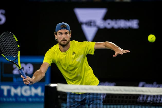 MELBOURNE, VIC - FEBRUARY 10: Maxime Cressy of the United States of America returns the ball during round 2 of the 2021 Australian Open on February 10 2020, at Melbourne Park in Melbourne, Australia. (Photo by Jason Heidrich Icon Sportswire) TENNIS: FEB 10 Australian Open Icon2102101853