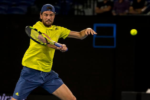MELBOURNE, VIC - FEBRUARY 10: Maxime Cressy of the United States of America returns the ball during round 2 of the 2021 Australian Open on February 10 2020, at Melbourne Park in Melbourne, Australia. (Photo by Jason Heidrich Icon Sportswire) TENNIS: FEB 10 Australian Open Icon2102101903