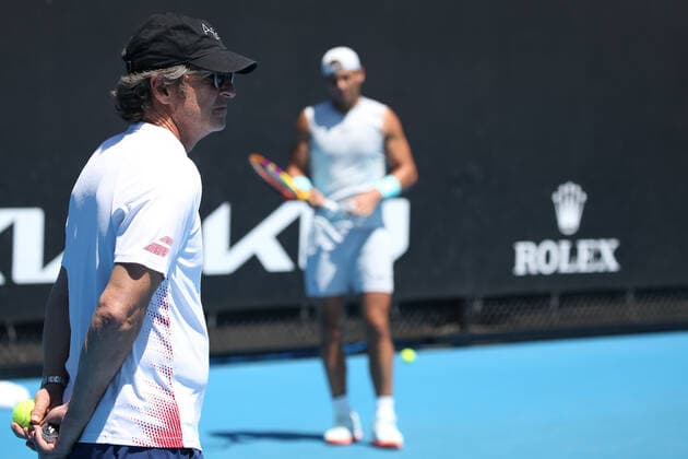 Francisco Roig, ESP, practising with Rafael Nadal on day three of 2021 Australian Open in Melbourne, 10 02 2021; -