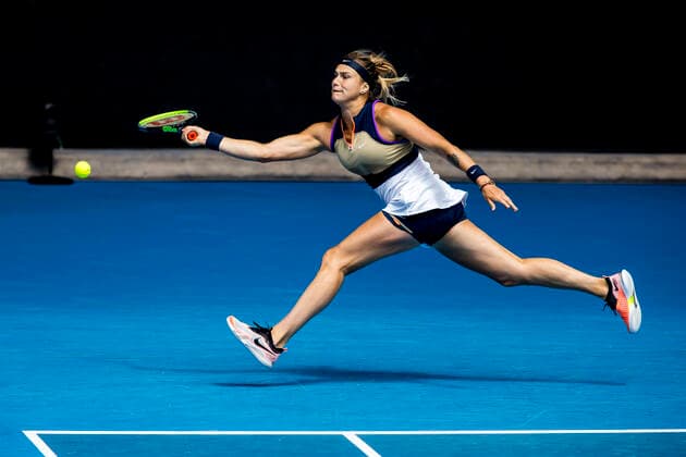 MELBOURNE, VIC - FEBRUARY 14: Aryna Sabalenka of Belarus returns the ball during round 4 of the 2021 Australian Open on February 14, 2020, at Melbourne Park in Melbourne, Australia. (Photo by Jason Heidrich Icon Sportswire) TENNIS: FEB 14 Australian Open Icon2102140947