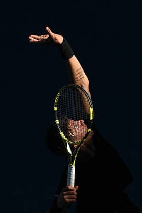 TENNIS AUSTRALIAN OPEN, Thanasi Kokkinakis of Australia serves during his second Round Men s doubles match with Nick Kyrgios of Australia against Lukasz Kubot of Poland (R) and Wesley Koolhof of the Netherlands on Day 7 of the Australian Open at Melbourne Park in Melbourne, Sunday, February 14, 2021. ( NO ARCHIVING, EDITORIAL USE ONLY, NO USE IN BOOKS WITHOUT CONSENT MELBOURNE VIC AUSTRALIA  Copyright: xDEANxLEWINSx 20210214001520492158
