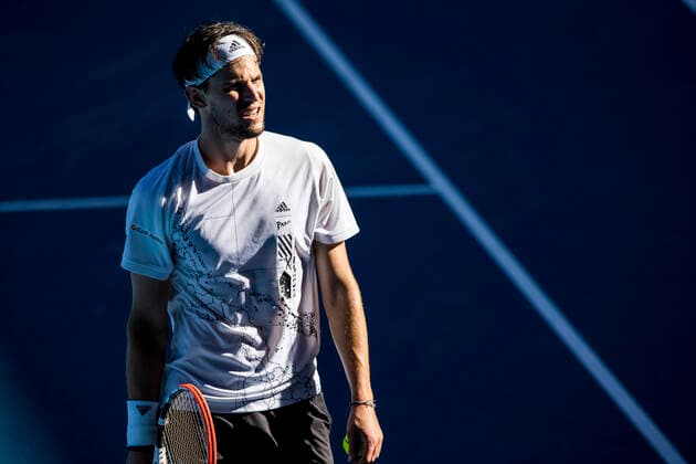 MELBOURNE, VIC - FEBRUARY 14: Dominic Thiem of Austria in action during round 4 of the 2021 Australian Open on February 14 2020, at Melbourne Park in Melbourne, Australia. (Photo by Jason Heidrich Icon Sportswire) TENNIS: FEB 14 Australian Open Icon2102141237