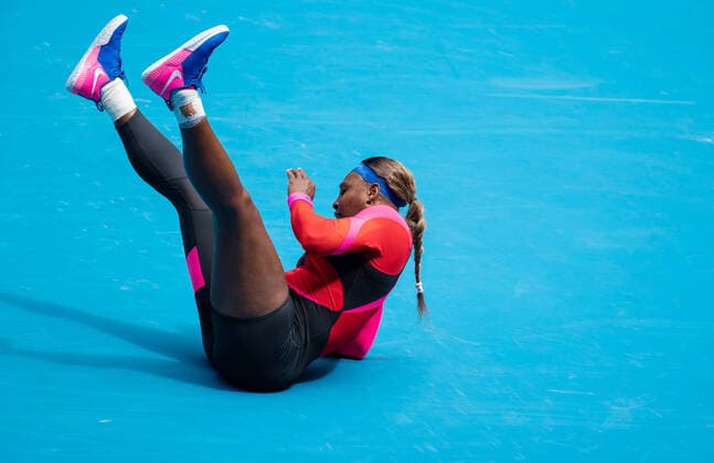 (210214) -- MELBOURNE, Feb. 14, 2021 -- Serena Williams falls on the ground during the women s singles 4th round match between Serena Williams of the United States and Aryna Sabalenka of Belarus at the Australian Open 2021 tennis tournament in Melbourne Park, Melbourne, Australia, on Feb. 14, 2021. (Photo by Xinhua) (SP)AUSTRALIA-MELBOURNE-TENNIS-AUSTRALIAN OPEN-DAY 7 HuxJingchen 