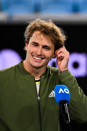 TENNIS AUSTRALIAN OPEN, Alexander Zverev of Germany reacts during a post match interview after winning his fourth Round Men s singles match against Dusan Lajovic of Serbia on Day 7 of the Australian Open at Melbourne Park in Melbourne, Sunday, February 14, 2021. ( NO ARCHIVING, EDITORIAL USE ONLY, NO USE IN BOOKS WITHOUT CONSENT MELBOURNE VIC AUSTRALIA  Copyright: xDEANxLEWINSx 20210214001520517164