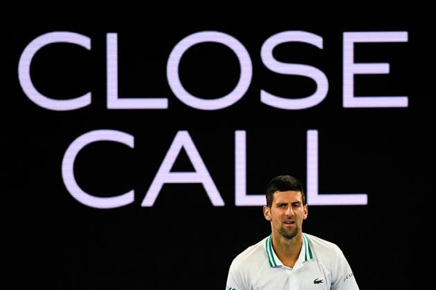 TENNIS AUSTRALIAN OPEN, Novak Djokovic of Serbia reacts during his fourth Round Men s singles match against Milos Raonic of Canada on Day 7 of the Australian Open at Melbourne Park in Melbourne, Sunday, February 14, 2021. ( NO ARCHIVING, EDITORIAL USE ONLY, NO USE IN BOOKS WITHOUT CONSENT MELBOURNE VIC AUSTRALIA  Copyright: xDAVExHUNTx 20210214001520522788