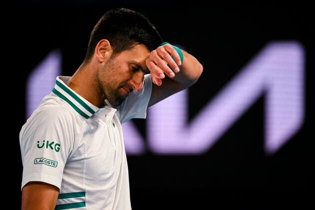 TENNIS AUSTRALIAN OPEN, Novak Djokovic of Serbia reacts during his fourth Round Men s singles match against Milos Raonic of Canada on Day 7 of the Australian Open at Melbourne Park in Melbourne, Sunday, February 14, 2021. ( NO ARCHIVING, EDITORIAL USE ONLY, NO USE IN BOOKS WITHOUT CONSENT MELBOURNE VIC AUSTRALIA  Copyright: xDEANxLEWINSx 20210214001520525865