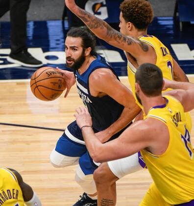 Minnesota Timberwolves guard Ricky Rubio (L) drives past Los Angeles Lakers center Marc GasolÊ(B-R) and Los Angeles Lakers forward Kyle KuzmaÊ(T-R) during second half of the NBA, Basketball Herren, USA basketball game between the Los Angeles Lakers and the Minnesota Timberwolves at Target Center in Minneapolis, Minnesota, USA, 16 February, 2021. Los Angeles Lakers vs. Minnesota Timberwolves !ACHTUNG: NUR REDAKTIONELLE NUTZUNG!  Copyright: xCRAIGxLASSIGx AME6280 20210217-637491314851950107