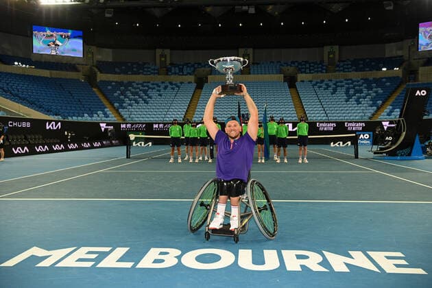 TENNIS AUSTRALIAN OPEN, Dylan Alcott of Australia poses with the championship trophy after winning his Quad Wheelchair Singles Final match against Sam Schroder of the Netherlands on Day 10 of the Australian Open at Melbourne Park in Melbourne, Wednesday, February 17, 2021. ( NO ARCHIVING, EDITORIAL USE ONLY, NO USE IN BOOKS WITHOUT CONSENT MELBOURNE VIC AUSTRALIA  Copyright: xDEANxLEWINSx 20210218001521230795