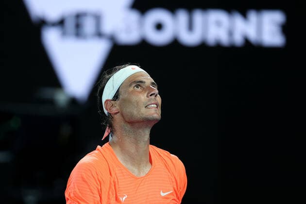 (210217) -- MELBOURNE, Feb. 17, 2021 -- Rafael Nadal reacts during the men s singles quarterfinal match between Rafael Nadal of Spain and Stefanos Tsitsipas of Greece at Australian Open in Melbourne Park, in Melbourne, Australia, on Feb. 17, 2021. ) (SP)AUSTRALIA-MELBOURNE-TENNIS-AUSTRALIAN OPEN-DAY 10 BaixXuefei 