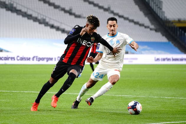 Robson Bambu (OGC Nice) - Saif Eddine Khaoui (Olympique de Marseille) FOOTBALL : Olympique de Marseille vs OGC Nice - Ligue 1 Uber Eats - Marseille - 17 02 2021 NorbertScanella PanoramiC 