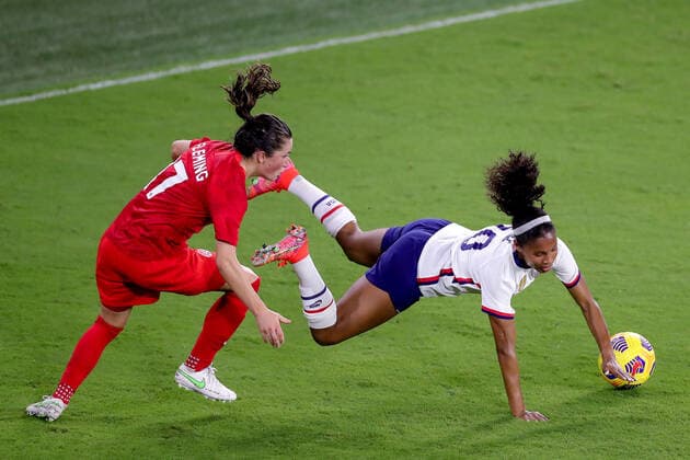 February 18, 2021: United States defender MARGARET PURCE (20) gets tripped by Canada midfielder JESSIE FLEMING (17) during the SheBelieves Cup United States vs Canada match at Exploria Stadium in Orlando, Fl on February 18, 2021. - ZUMAk149 20210218_zsp_k149_062 Copyright: xCoryxKnowltonx