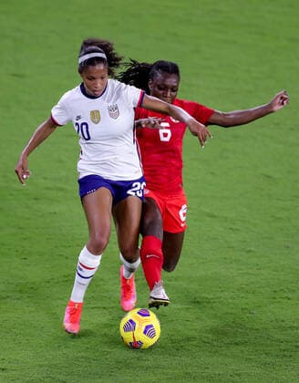 February 18, 2021: United States defender MARGARET PURCE (20) competes for the ball against Canada forward DEANNE ROSE (6) during the SheBelieves Cup United States vs Canada match at Exploria Stadium in Orlando, Fl on February 18, 2021. - ZUMAk149 20210218_zsp_k149_069 Copyright: xCoryxKnowltonx
