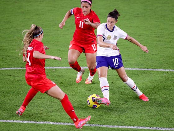February 18, 2021: United States forward CARLI LLOYD (10) competes for the ball against Canada midfielder DESIREE SCOTT (11) during the SheBelieves Cup United States vs Canada match at Exploria Stadium in Orlando, Fl on February 18, 2021. - ZUMAk149 20210218_zsp_k149_044 Copyright: xCoryxKnowltonx