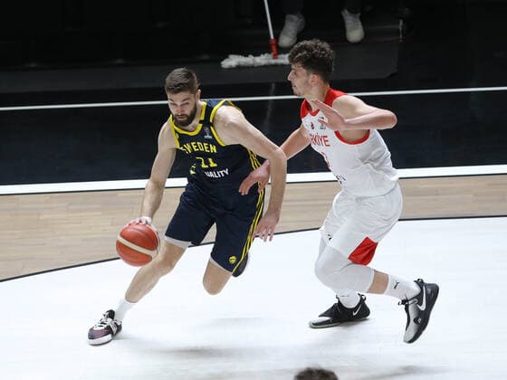 Alperen Sengun of Turkey and William Magarity (11) of Sweden FIBA Eurobasket Qualifiers Group D match between Turkey and Sweden at Besiktas Akatlar Arena in Istanbul , Turkey on February 20 , 2021. 