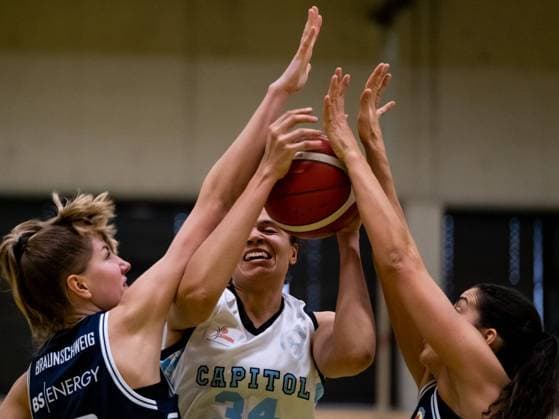 Duesseldorf, Germany, Feb. 20th Hard fight for the ball during the Toyota 2. Basketball Bundesliga Nord between the Capitol Bascats Duesseldorf and Eintracht Braunschweig at Wekita Sportarena in Duesseldorf Toyota 2. Basketball Bundesliga Nord - Capitol Bascats Duesseldo 