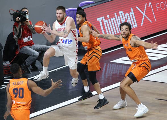 Basketball, EM Quali, Kroatien - Niederlande Dominik Mavra of Croatia (L) and Johan Willem Van Zegeren (C) , Jito Kok (R) of Netherlands during the FIBA Eurobasket Qualifiers Group D match between Croatia and Netherlands at Besiktas Akatlar Arena in Istanbul , Turkey on February 20 , 2021. 